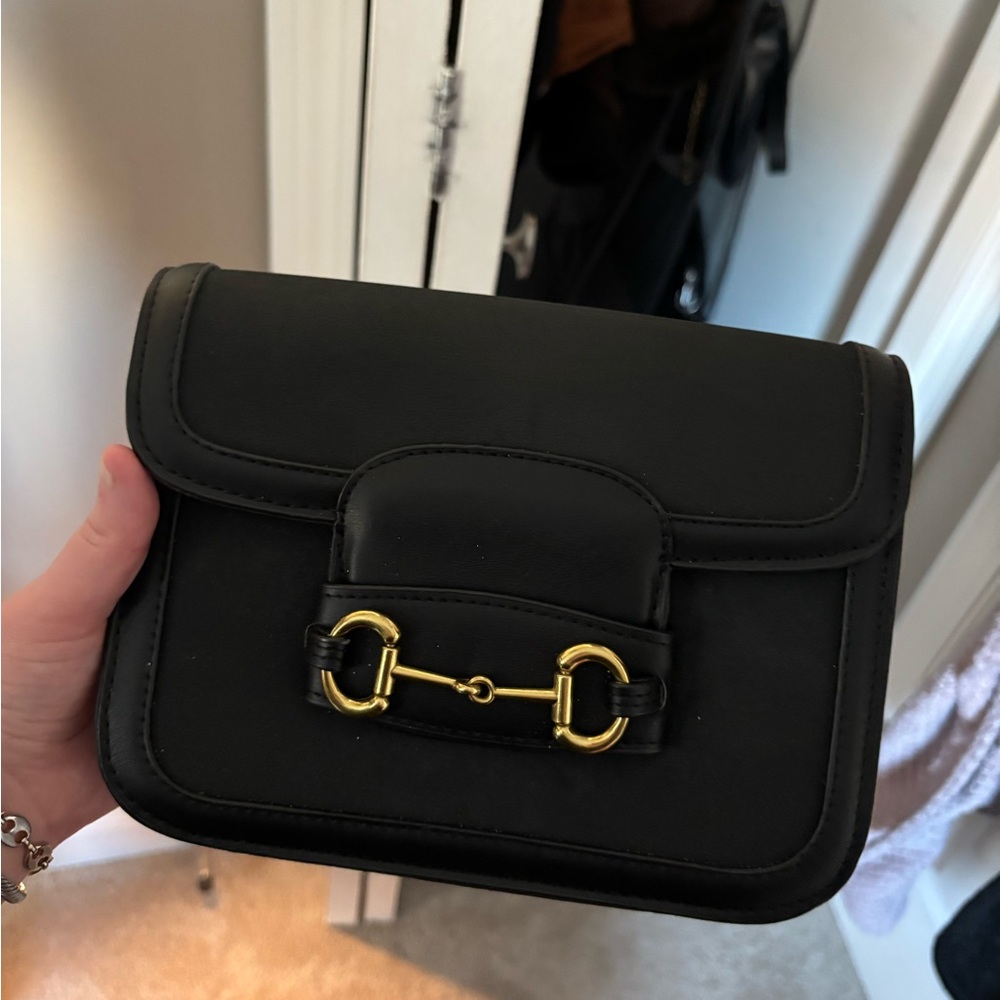 Black horsebit bag